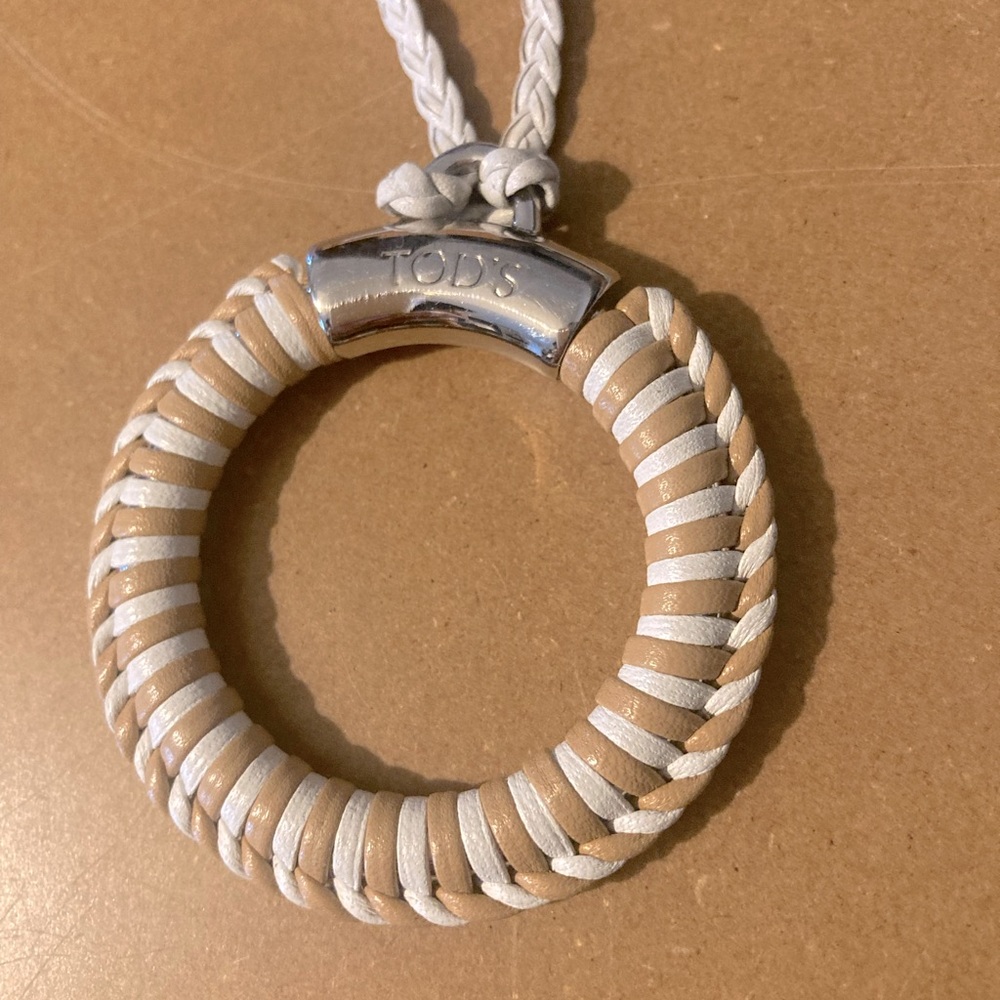 Tod’s necklace leather braided strap and pendant with leather weaving